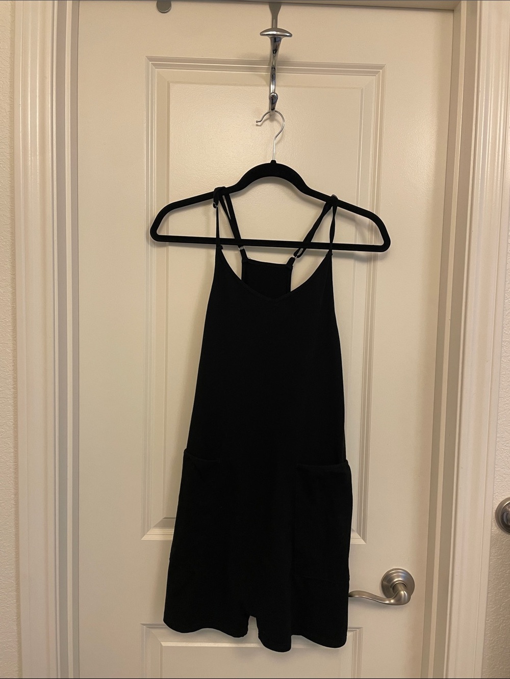 Women’s black romper with pockets